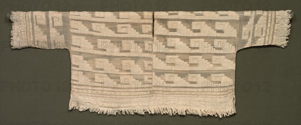 Tunic, 1100-1532. Peru, Chimú or Chimú-Inka, 12th-16th century. White cotton; plain weave with supplementary weft brocading; overall: 57.2 x 151.1 cm (22 1/2 x 59 1/2 in.)