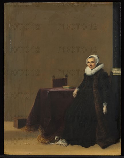 Portrait of a Woman with a Dog, c. 1635. Hendrik Gerritsz. Pot (Dutch, c. 1585-1657). Oil on wood; framed: 77 x 67 x 7 cm (30 5/16 x 26 3/8 x 2 3/4 in.); unframed: 41.8 x 32 cm (16 7/16 x 12 5/8 in.).