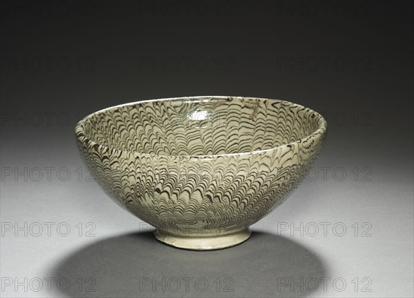 Marbled Bowl, 1100s. China, possibly Henan province, Xinwu, Dangyangyu, Northern Song dynasty (960-1127). Glazed stoneware; diameter: 7 x 13.3 cm (2 3/4 x 5 1/4 in.).