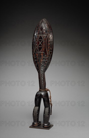 Feast Ladle, possibly late 1800s or early 1900s. Guinea Coast, Ivory Coast, Dan People. Wood, cord; overall: 57.3 cm (22 9/16 in.)