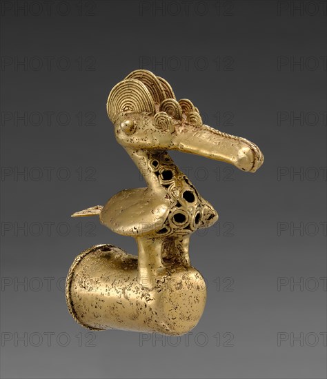 Finial with Long-Beaked Bird, 400-1000. Isthmian Region (Colombia), Sinú (Zenú), 5th century-11th century. Gold, cast; overall: 11.1 x 4.3 x 9.5 cm (4 3/8 x 1 11/16 x 3 3/4 in.).