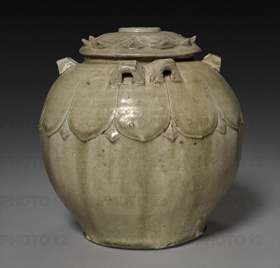Covered Jar with Carved Lotus Petals, 386-581. China, Northern Dynasties period (386-581). lid: 2.8 x 14.1 cm (1 1/8 x 5 9/16 in.); vessel only: 21.8 x 24.3 cm (8 9/16 x 9 9/16 in.).