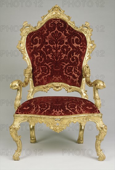 One armchair; Venice, Veneto, Italy; about 1730 - 1740; Carved, gessoed, and gilt walnut; upholstered in modern Genoese velvet