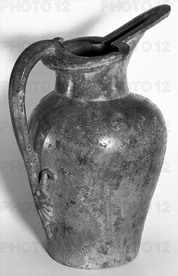 Etruscan Beak-Spouted Oinochoe; Etruria; early 5th century B.C; Bronze; 19.1 cm, 7 1,2 in