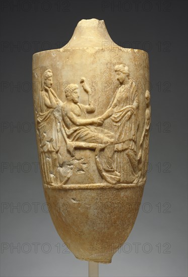 Sculpted Vessel with a Family Scene; Greece, Attica, about 360 B.C; Marble; 56.5 × 25.4 cm, 22 1,4 × 10 in