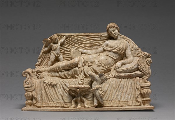 Imitation of a Statuette of a Female Reclining on a Couch with Erotes; Italy, ?, 1875 - 1890; Terracotta, pigment, and gold