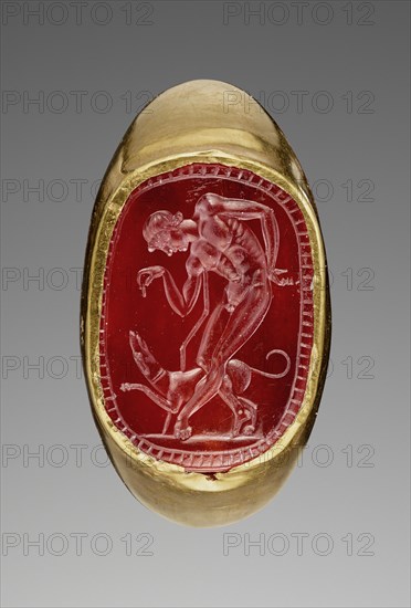 Youth and Dog; Italy; 3rd - 2nd century B.C; Gold; carnelian; 1.8 × 1.3 cm, 11,16 × 1,2 in