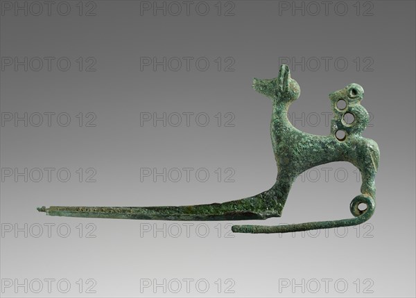 Pin Shaped as a Dog with a Monkey; Etruria; 700 - 650 B.C; Bronze; 3.8 × 7.6 × 2 cm, 1 1,2 × 3 × 13,16 in