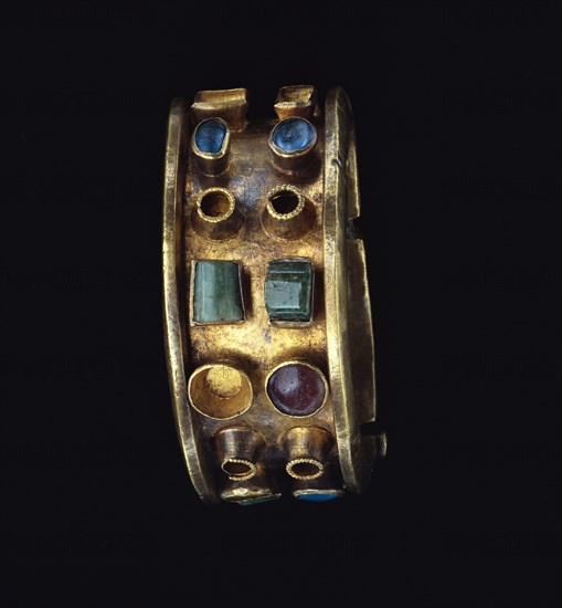 Bracelet; Roman Empire; 250 - 400; Gold, glass, and emeralds; 3.2 × 6.4 cm, 1 1,4 × 2 1,2 in