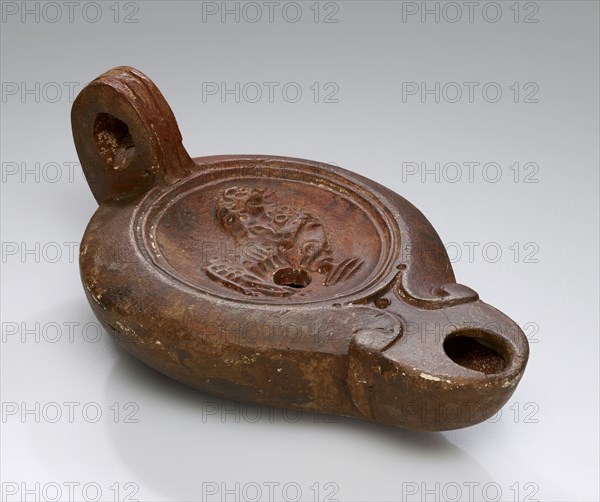 Lamp, North Africa; 1st - 4th century; Terracotta; 3.1 x 7.9 x 12.5 cm, 1 1,4 x 3 1,8 x 4 15,16 in