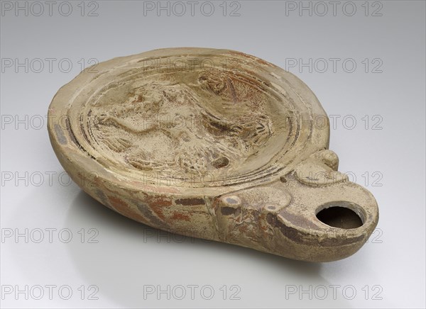 Lamp, North Africa; 1st - 4th century; Terracotta; 2.7 x 9 x 12.5 cm, 1 1,16 x 3 9,16 x 4 15,16 in