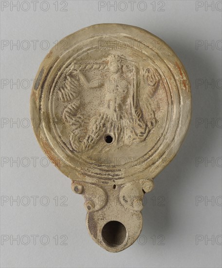 Lamp, North Africa; 1st - 4th century; Terracotta; 2.7 x 9 x 12.5 cm, 1 1,16 x 3 9,16 x 4 15,16 in