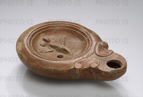 Lamp, North Africa; 1st - 4th century; Terracotta; 2.7 x 8 x 10.7 cm, 1 1,16 x 3 1,8 x 4 3,16 in