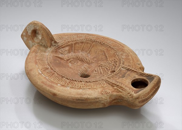 Lamp, North Africa; 1st - 4th century; Terracotta; 2.3 x 8.2 x 11.6 cm, 7,8 x 3 1,4 x 4 9,16 in