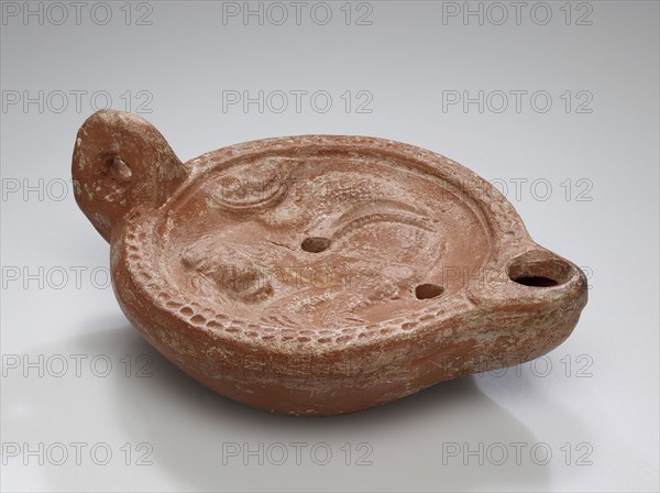 Lamp, North Africa; 1st - 4th century; Terracotta; 3.2 x 9.5 x 12.3 cm, 1 1,4 x 3 3,4 x 4 13,16 in