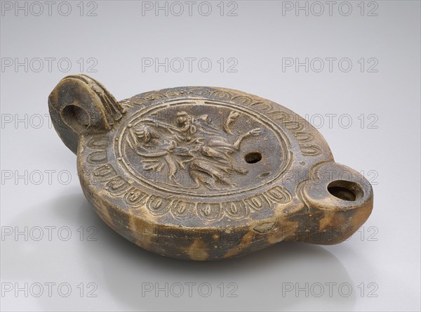 Lamp, North Africa; 1st - 4th century; Terracotta; 2.6 x 8.2 x 11.5 cm, 1 x 3 1,4 x 4 1,2 in