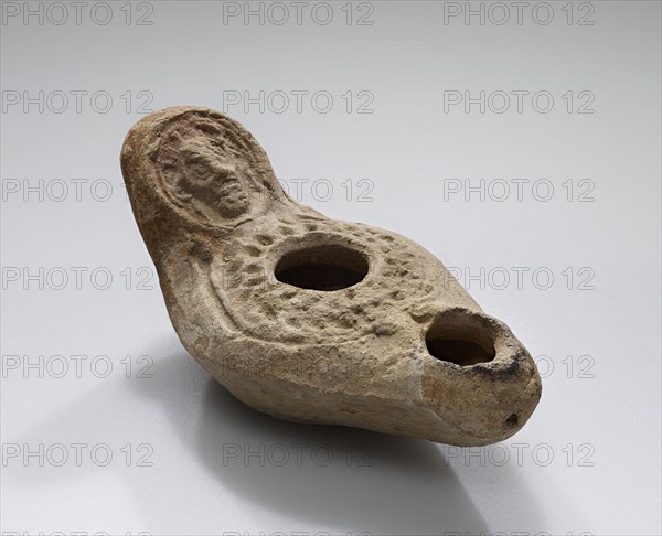 Lamp, Roman Empire; 1st century B.C. - 4th century A.D; Terracotta; 4.3 x 5.2 x 9.6 cm, 1 11,16 x 2 1,16 x 3 3,4 in