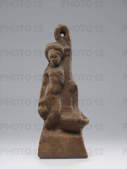 Lamp, Roman Empire; 1st century B.C. - 4th century A.D; Terracotta; 6.4 x 3.4 x 16.5 cm, 2 1,2 x 1 5,16 x 6 1,2 in