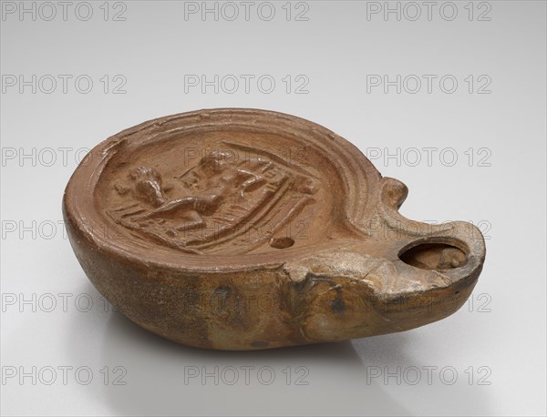 Lamp, Roman Empire; 1st century B.C. - 4th century A.D; Terracotta; 3.1 × 7 × 10 cm, 1 1,4 × 2 3,4 × 3 15,16 in
