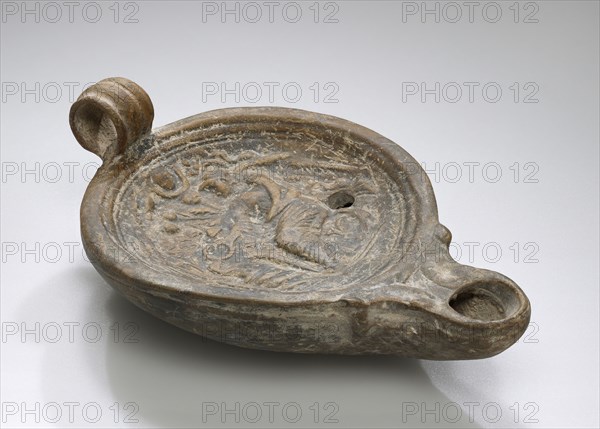 Lamp, Roman Empire; 1st century B.C. - 4th century A.D; Terracotta; 4 x 7.5 x 11.6 cm, 1 9,16 x 2 15,16 x 4 9,16 in