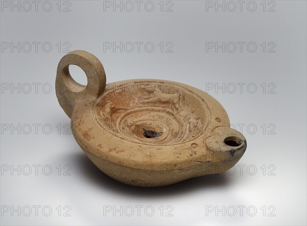 Lamp, Central Anatolia, Anatolia; 1st century B.C. - 4th century A.D; Terracotta; 3.3 x 8.6 x 11 cm, 1 5,16 x 3 3,8 x 4 5,16 in