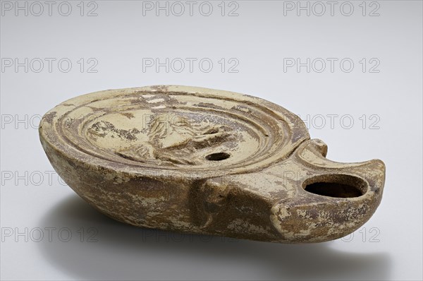Lamp; North Africa, Tunisia; second half of 1st century; Terracotta; 2.3 × 7.5 × 10.5 cm, 7,8 × 2 15,16 × 4 1,8 in