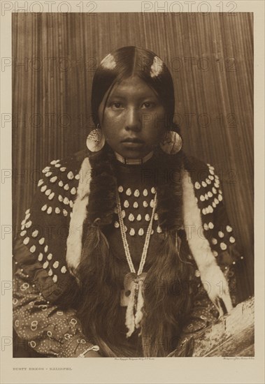 Dusty Dress - Kalispel; Edward S. Curtis, American, 1868 - 1952, 1910; Gravure; 40.1 x 28.1 cm 15 13,16 x 11 1,16 in