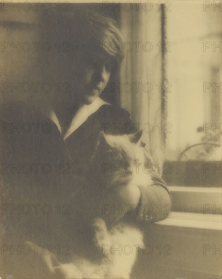 Portrait of a Woman Posed with a Cat Near a Window; Clarence H. White, American, 1871 - 1925, 1918 - 1920; Toned gelatin silver