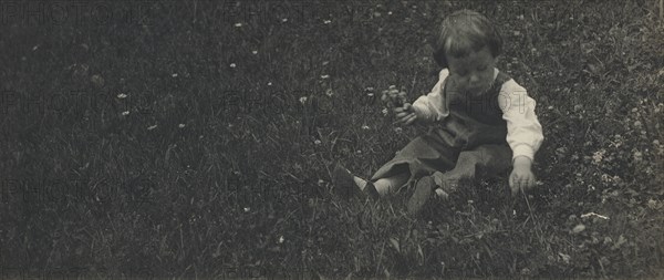 Charles O'Malley Sitting in the Grass Picking Flowers; Gertrude Käsebier, American, 1852 - 1934, Newport, Rhode Island, USA