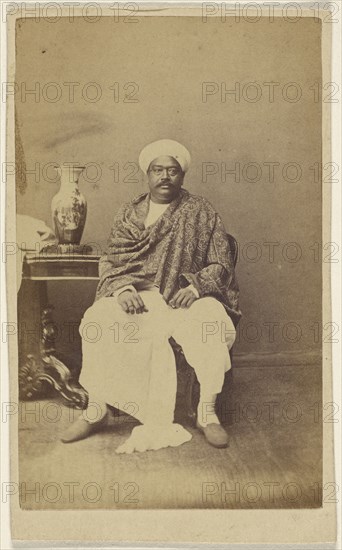 Hindu man in turban, seated; about 1865; Albumen silver print