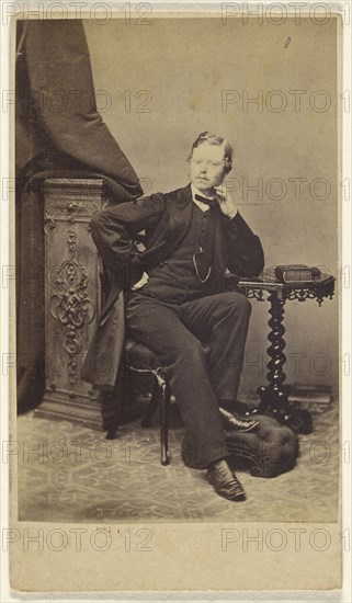 young man, seated; Kiesling Brothers; 1860s; Albumen silver print