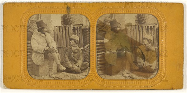 Man in tall hat and sheepskin coat with another man in cap seated up against a crate; 1855 - 1860; Hand-colored Albumen silver