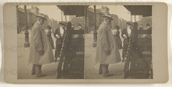 Elder man with hat reading newspapers at rack, Albany, N.Y; Julius M. Wendt, American, active 1900s - 1910s, 1900s; Gelatin