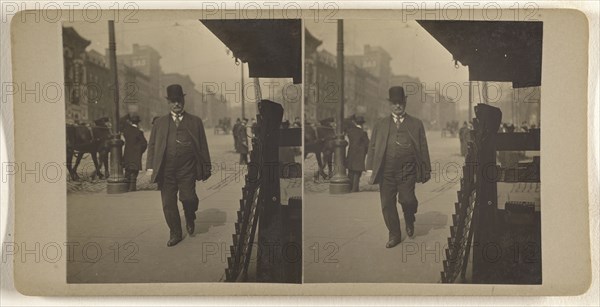 Man in derby walking down street, Albany, N.Y; Julius M. Wendt, American, active 1900s - 1910s, 1900s; Gelatin silver print