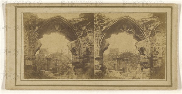 View of city through Gothic arch; 1855 - 1860; Albumen silver print