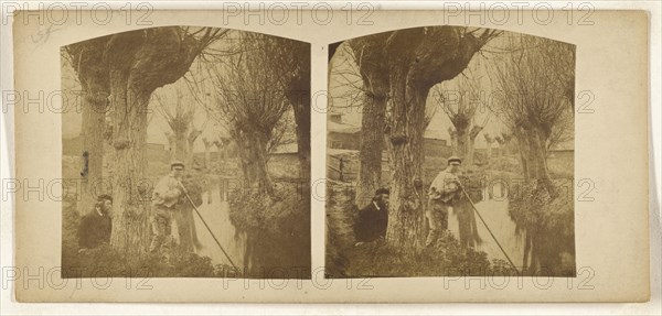 Boy at river with pole, bearded man with beret on riverbank; British; about 1860; Albumen silver print