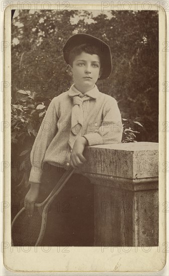 Young man wearing a beret, holding a tennis racket; American; about 1880; Gelatin silver print