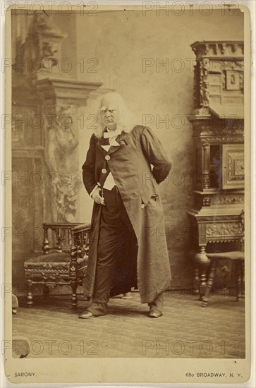 Actor in long white wig with white bushy eyebrows, standing; Napoleon Sarony, American, born Canada, 1821 - 1896, about 1885