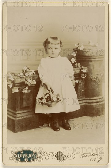 little girl standing, holding a basket of flowers; Henry C. Lovejoy, American, active Trenton, New Jersey 1860s - 1890s)