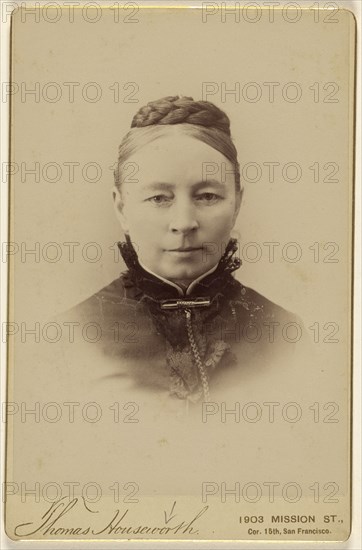 woman with braided hair wrapped at the top of her head, in vignette-style; Thomas Houseworth, American, 1829 - 1915, 1870s