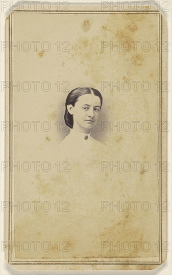 Vignetted portrait of an  woman; S.G. Sheaffer, American, active Hanover, Pennsylvania 1860s - 1870s, about 1862; Albumen