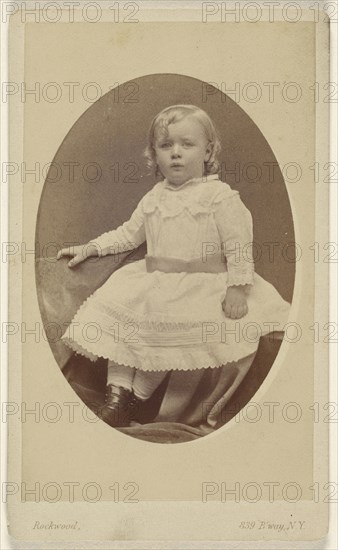 little girl seated, in oval style; George Gardner Rockwood, American, 1832 - 1911, about 1865; Albumen silver print