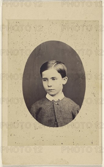 little boy, in quasi-oval style; about 1865; Albumen silver print