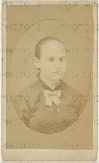 woman with her hair pulled back, printed in quasi-oval style; 1870 - 1875; Albumen silver print