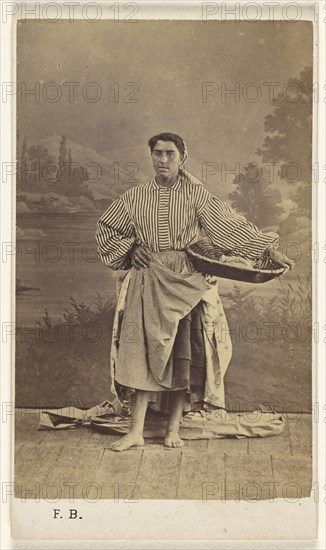 Genre portrait of an  woman holding a basket; Ferdinand Berillon, French, active 1860s, 1870 - 1875; Albumen silver print