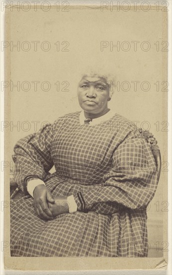 black woman with white hair, seated; H.J. Reed, American, active Worcester, Massachusetts 1860s, 1865 - 1870; Albumen silver