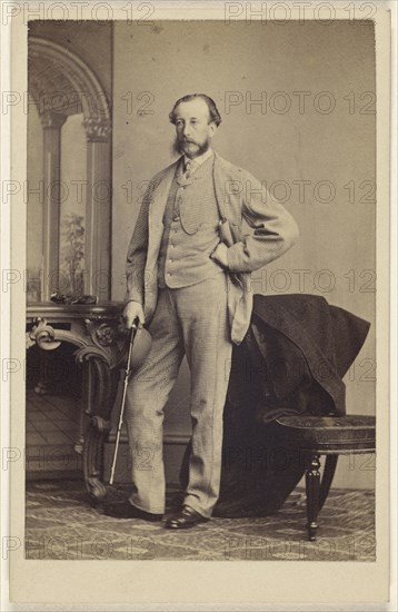 bearded man standing, holding a walking stick; Thomas Rodger, Scottish, 1832 - 1883, 1865 - 1870; Albumen silver print