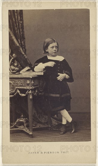 little girl standing, elbow on top of a closed book on a table; Mayer & Pierson, French, active 1855 - 1878, 1865 - 1870