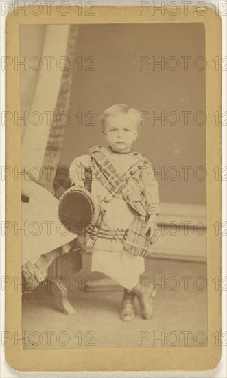 little boy standing, holding a cap; Fernando Dessaur, American, active 1880s, 1870 - 1875; Albumen silver print