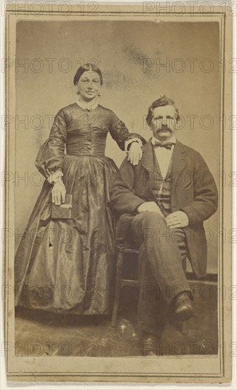 couple: woman standing holding a book and a man with moustache seated; J.W. Smith, American, active Lewistown, Pennsylvania